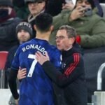 61e8b3b529dafAFPcliveRose Cristiano Ronaldo dan Ralf Rangnick (Foto AFP/Clive Rose).