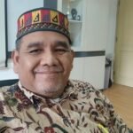 omjay batik peci aceh